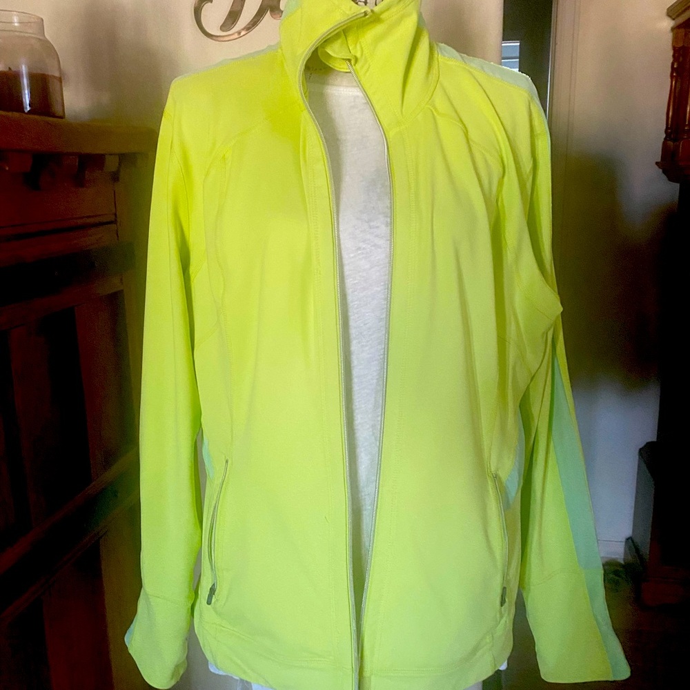 Tangerine zip up jacket.